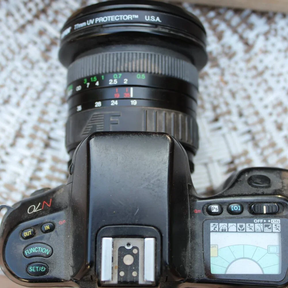 Nikon camera with fisheye lens (no battery) circa 1997